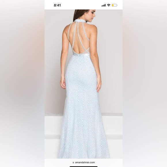 Colors Dress style #1869 this is a baby blue lace halter gown. Colors Dress style #1869 this is a baby blue lace halter gown.